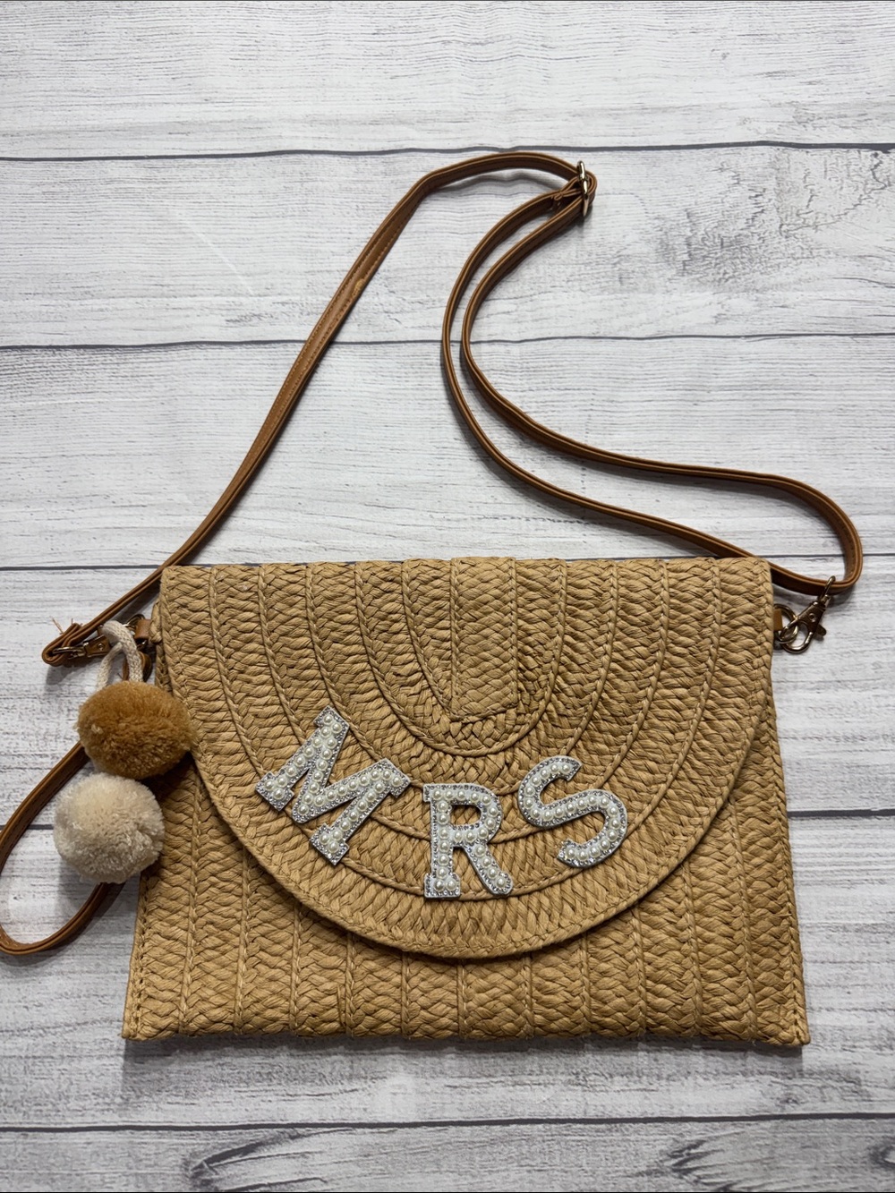 Bride’s Tan Woven Straw Crossbody Bag with Pom Pom Accent and Pearl “MRS”